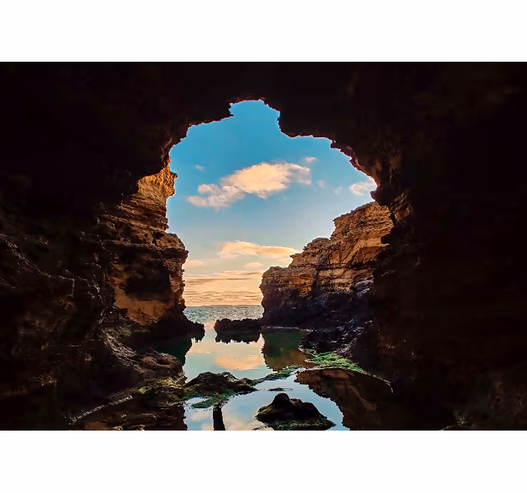 Tapisserie paysage vue de mer en grotte - TenStickers
