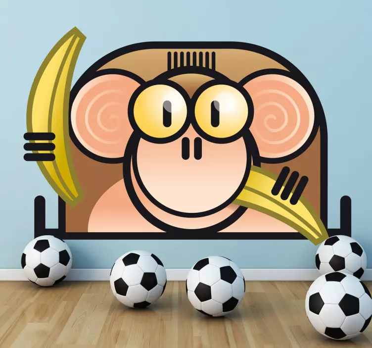 Sticker enfant singe mangeant des bananes - TenStickers