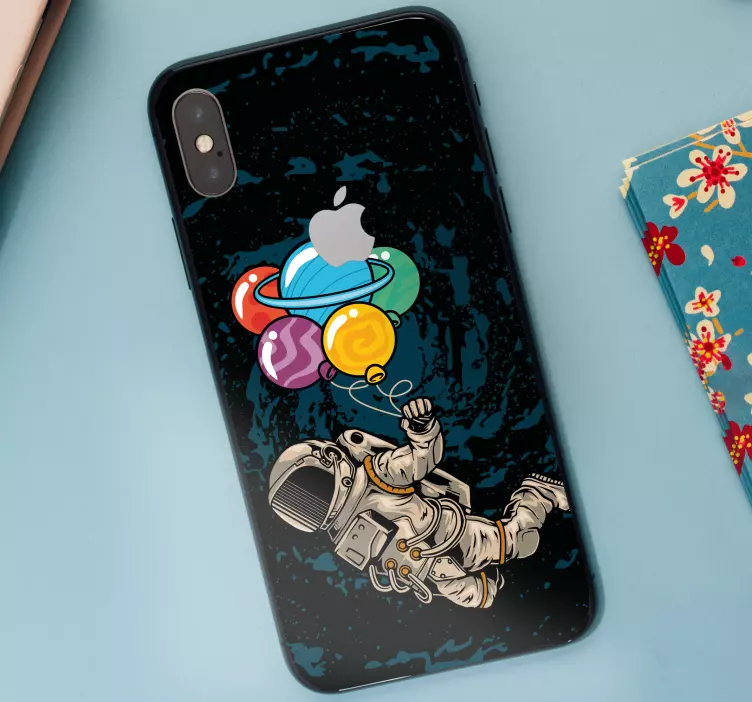 Sticker iphone astronaute avec des ballons - TenStickers