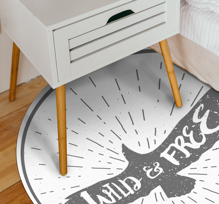 Tapis vinyle citation cercle sauvage et libre - TenStickers